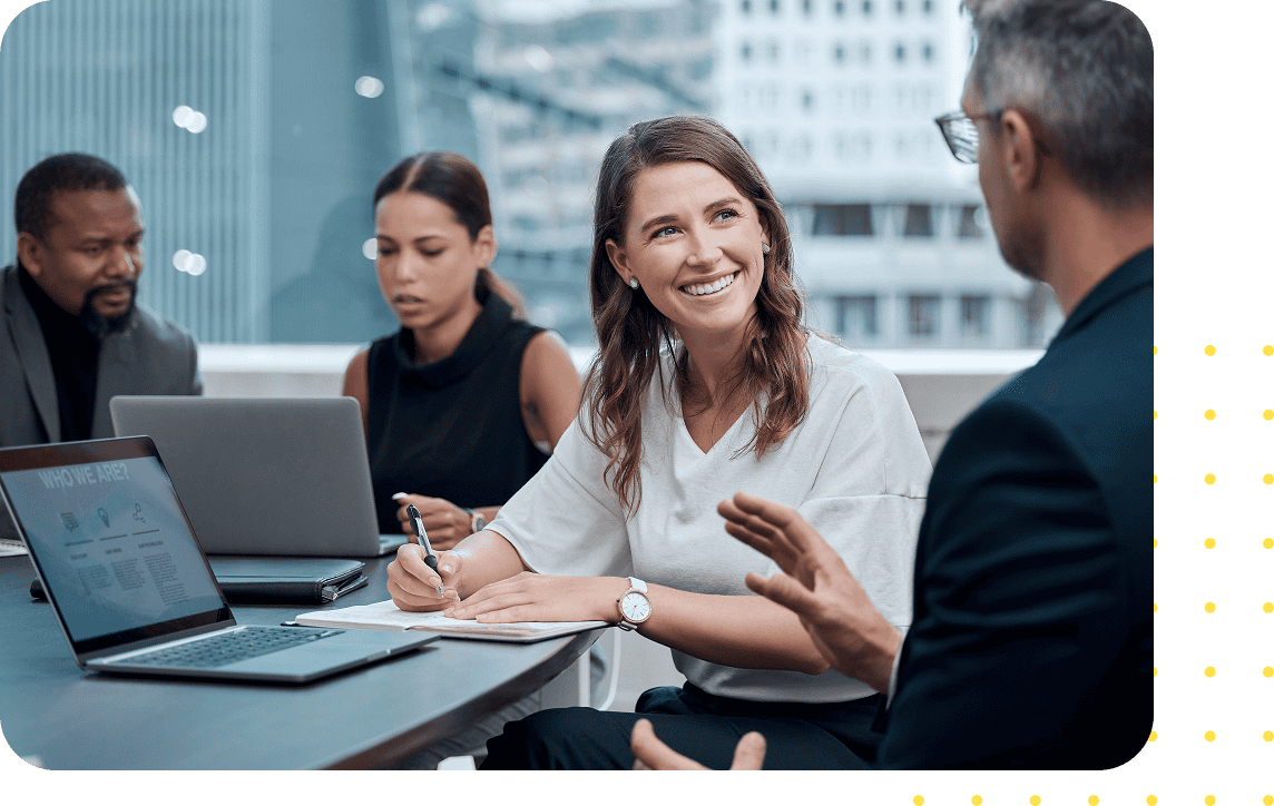 Smiling human relations coworkers with animated screenshot of UKG software dashboard.