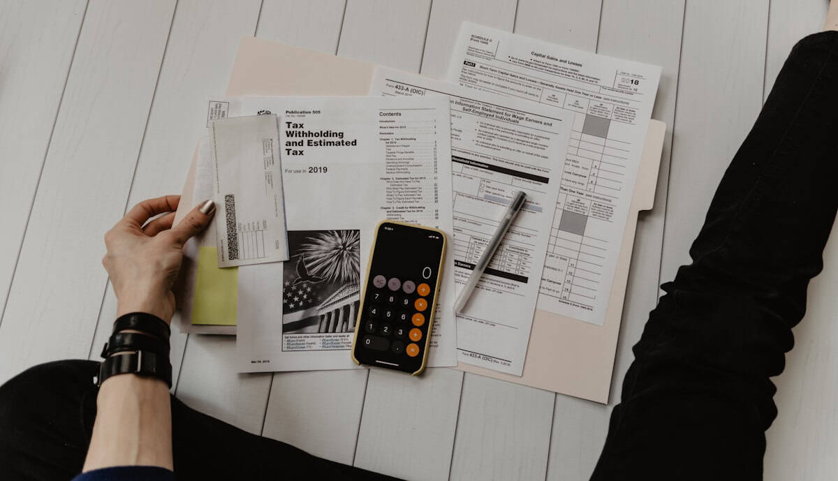 Payroll manager comparing UKG Ready vs Paychex platform features and total cost of ownership